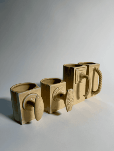 Four Tan Mugs